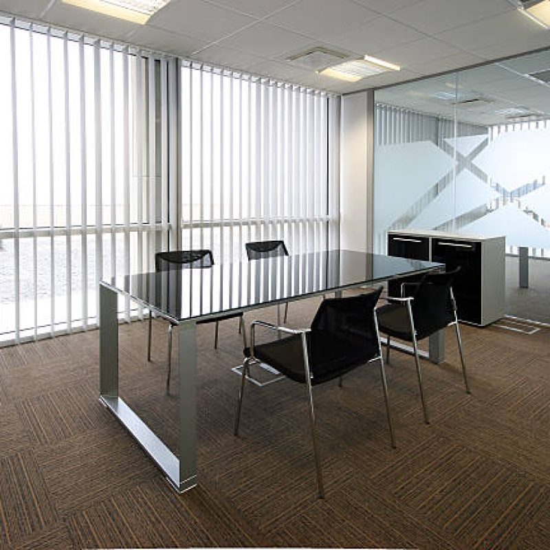 Open plan office lit by natural and artificial light
